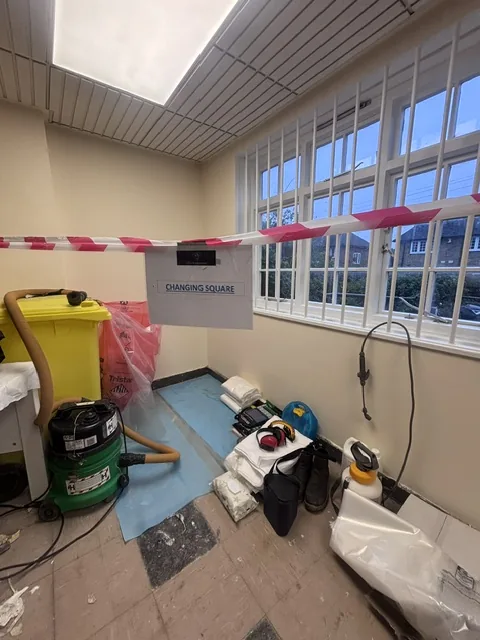 Asbestos floor tile and bitumen removal in Balham